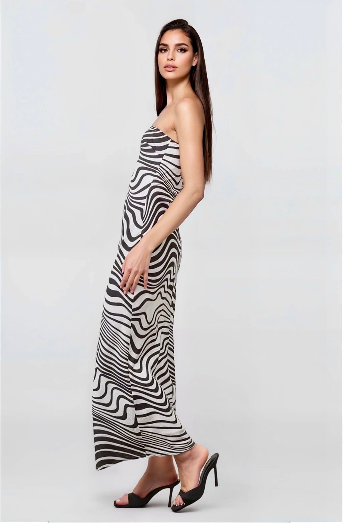 Close-up of black and white zebra print detailing on tube maxi dress