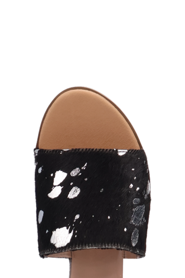 Fashion-forward fuchsia sandal with open toe and natural fur upper