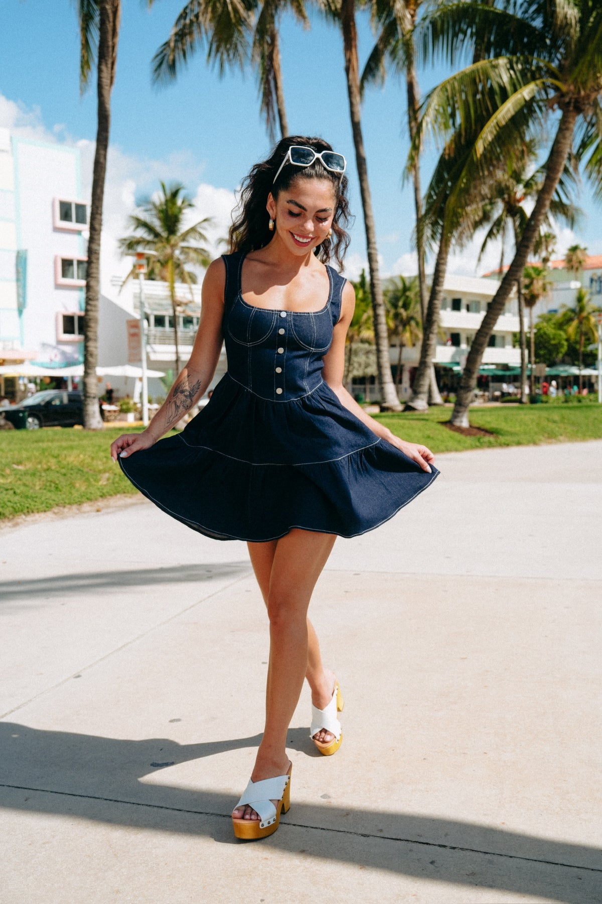 Denim mini dress with button detail and hidden back zipper for easy wear