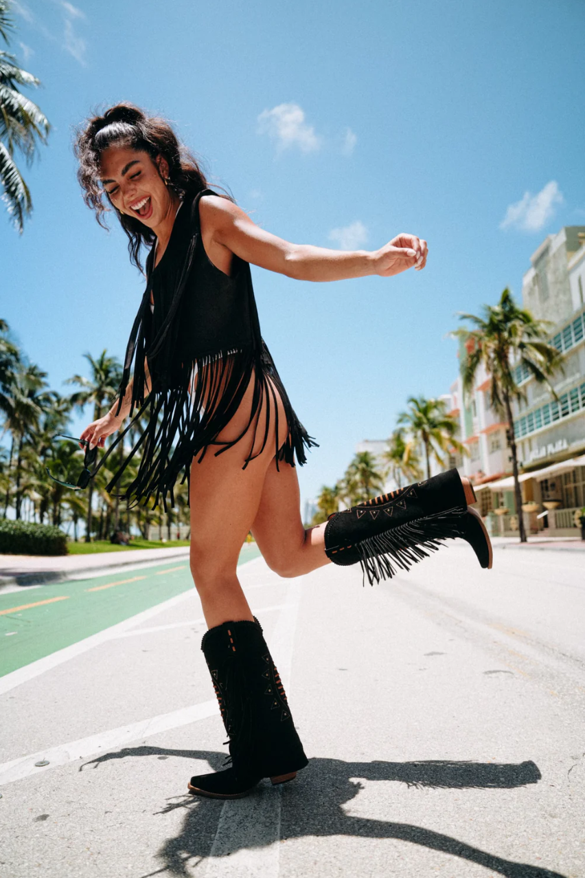 Falling Fringe Vest in black vegan suede with flirty fringe hem and open front