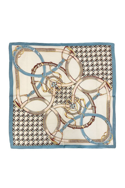 Trendy printed scarf worn as a head wrap, adding effortless glam to any outfit.