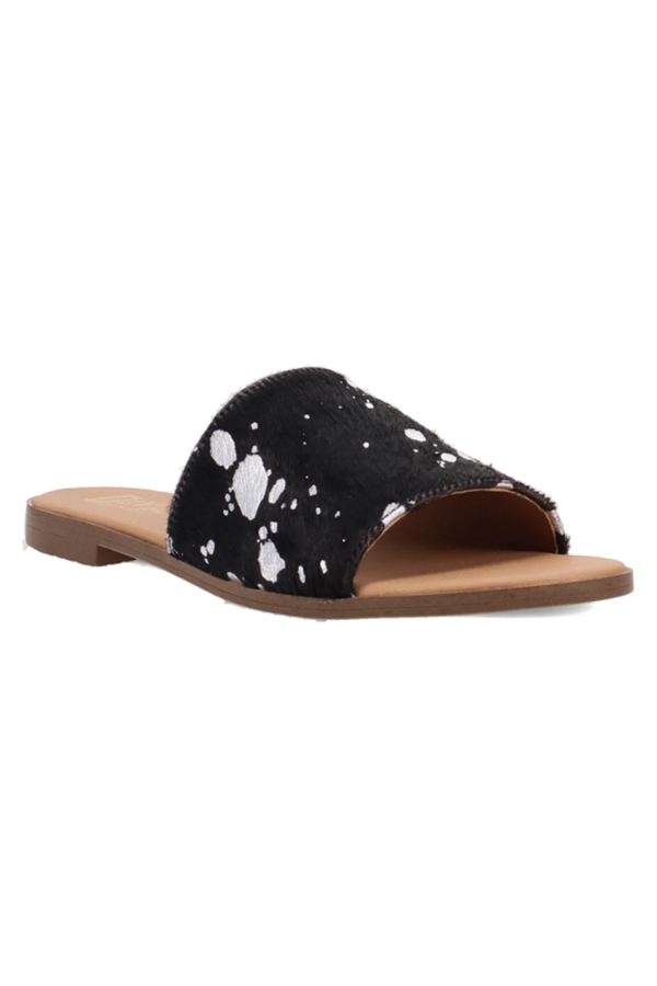 1/2 inch heel sandal with sleek, low-profile silhouette and luxe texture