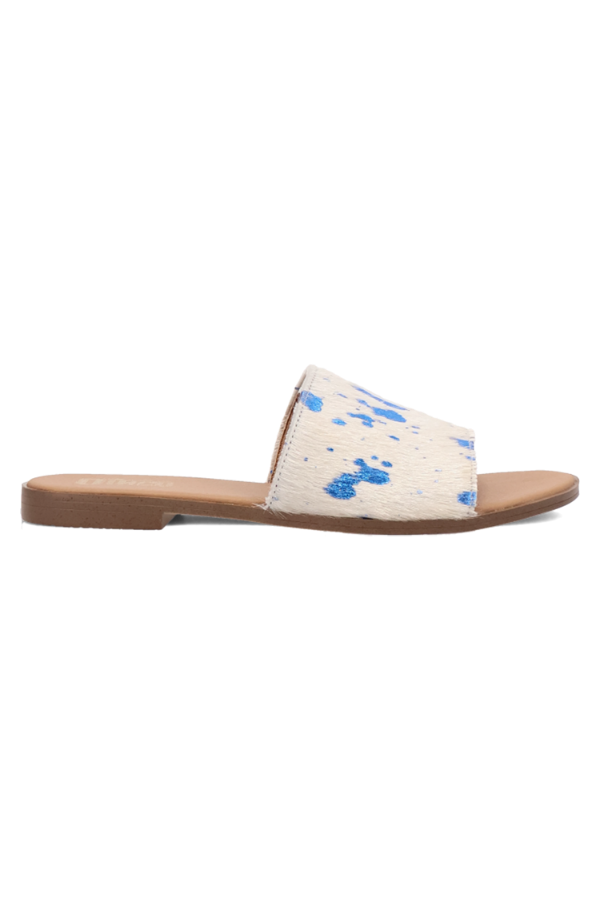 Close-up of luxe natural calf hair upper showing texture and bold color