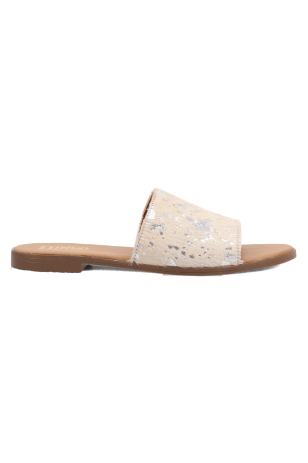 Open-toe sandal combining western flair and modern edge with natural materials