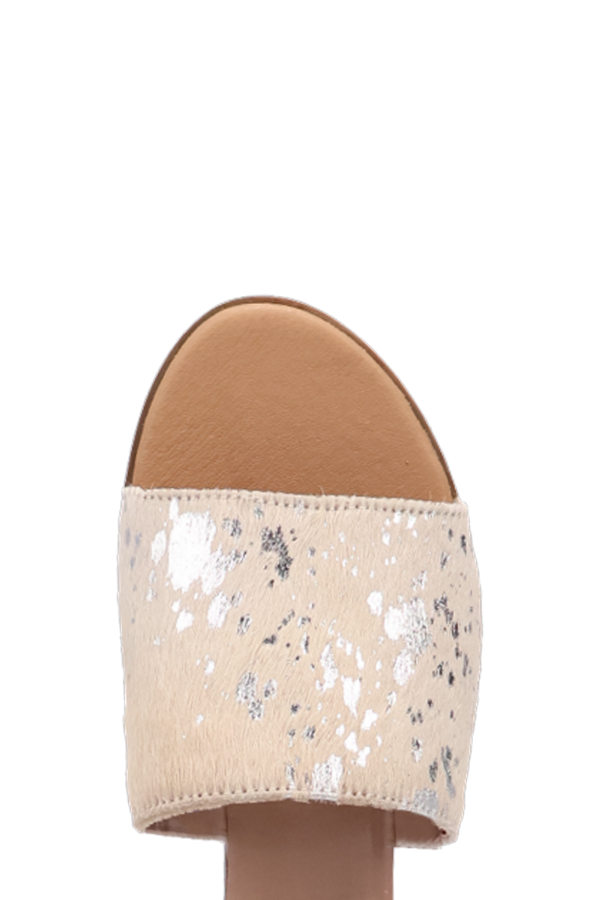 Front view of open-toe sandals with natural calf hair upper and sleek silhouette