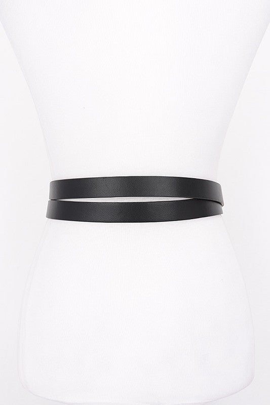 Trendy festival belt featuring a sleek PU leather strap and silver-toned buckle detail.