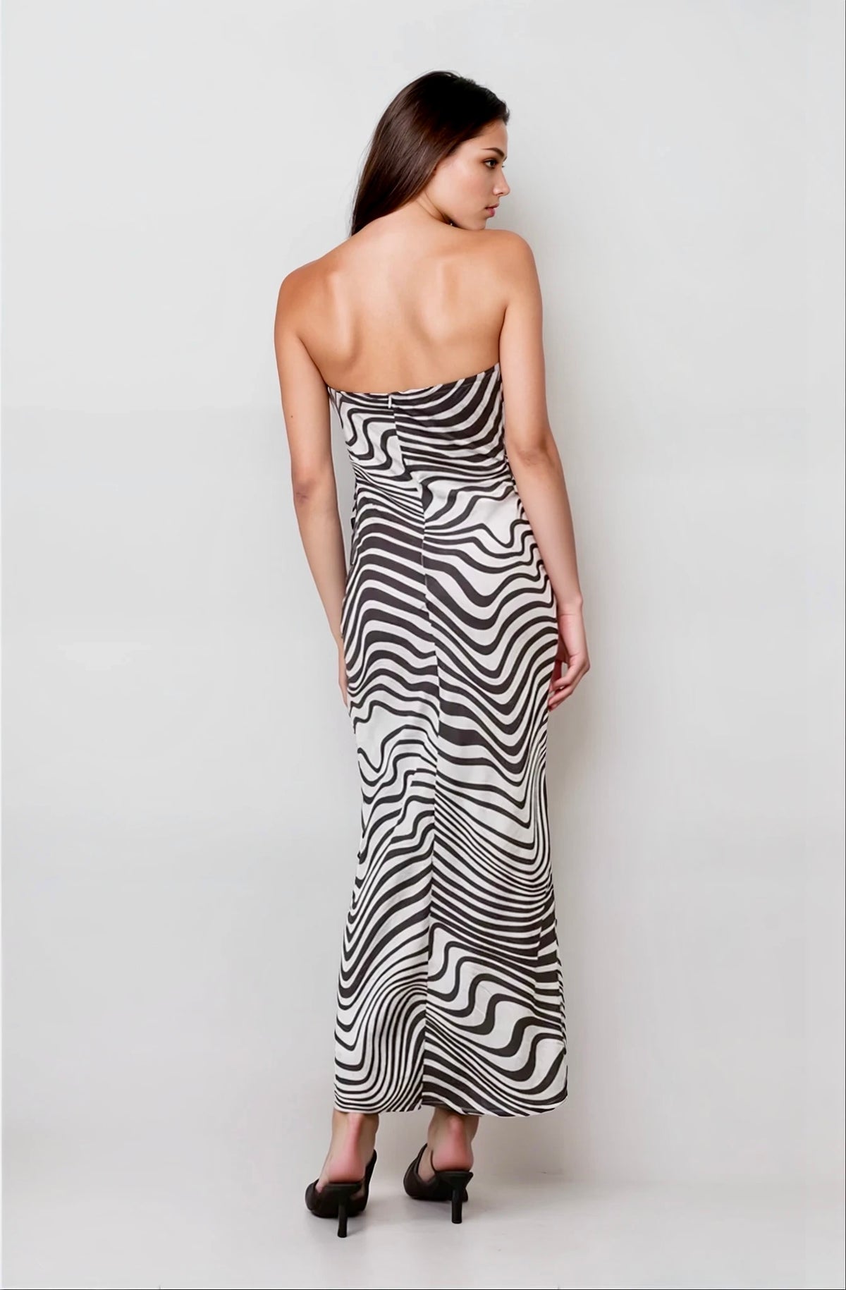 Sheer tube dress with zebra print, ideal for festival fashion and warm weather