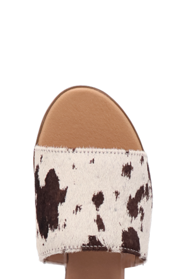 Side view of Tabby sandal showing 1/2” heel and textured sole