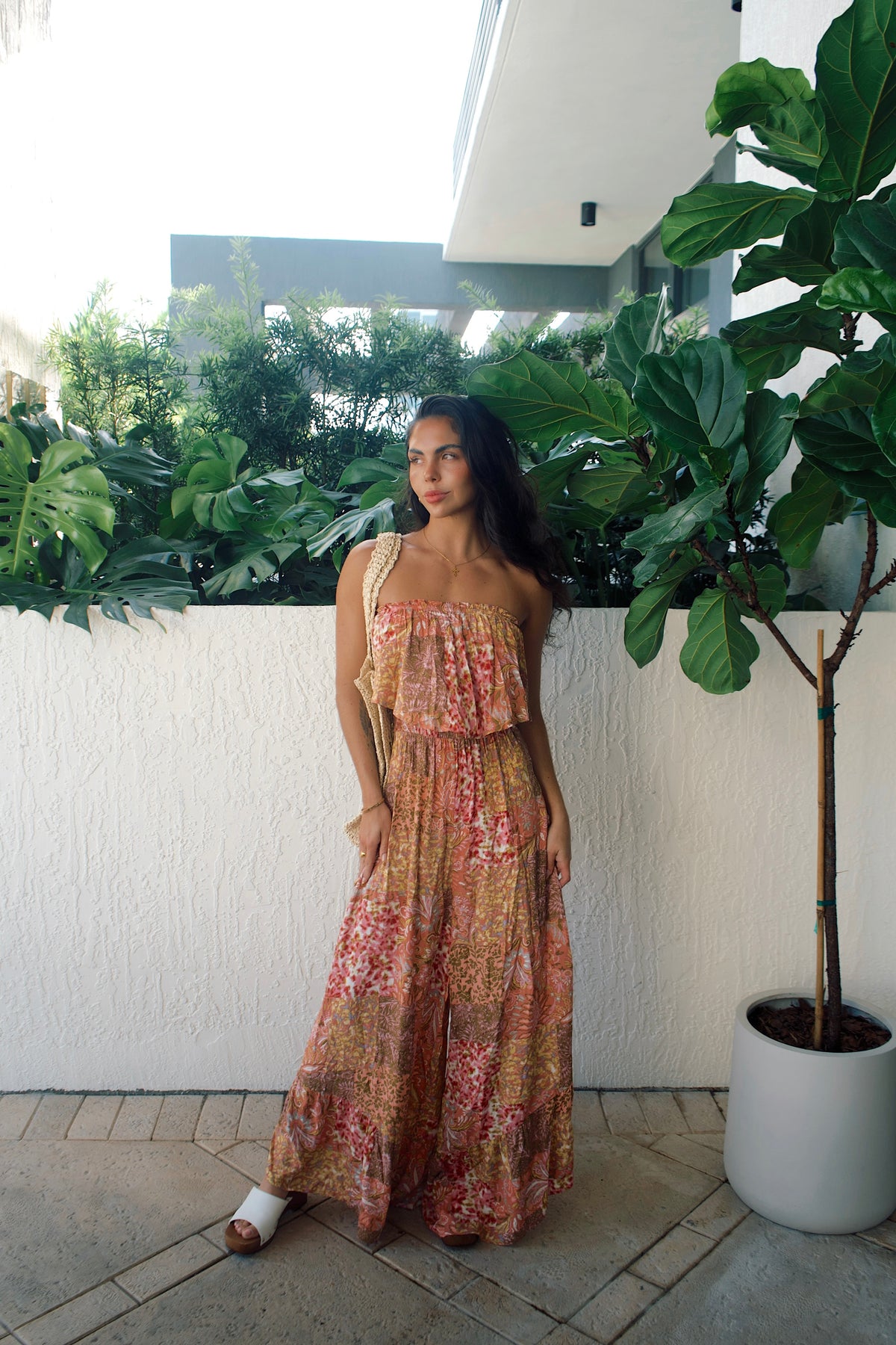 Alton jumpsuit featuring a flirty high-low hem and elegant wide-leg cut
