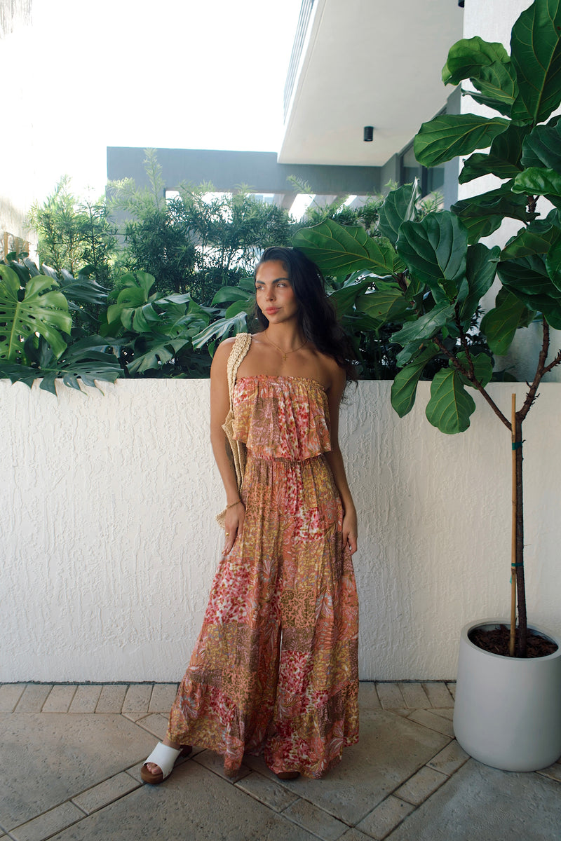 Alton jumpsuit featuring a flirty high-low hem and elegant wide-leg cut
