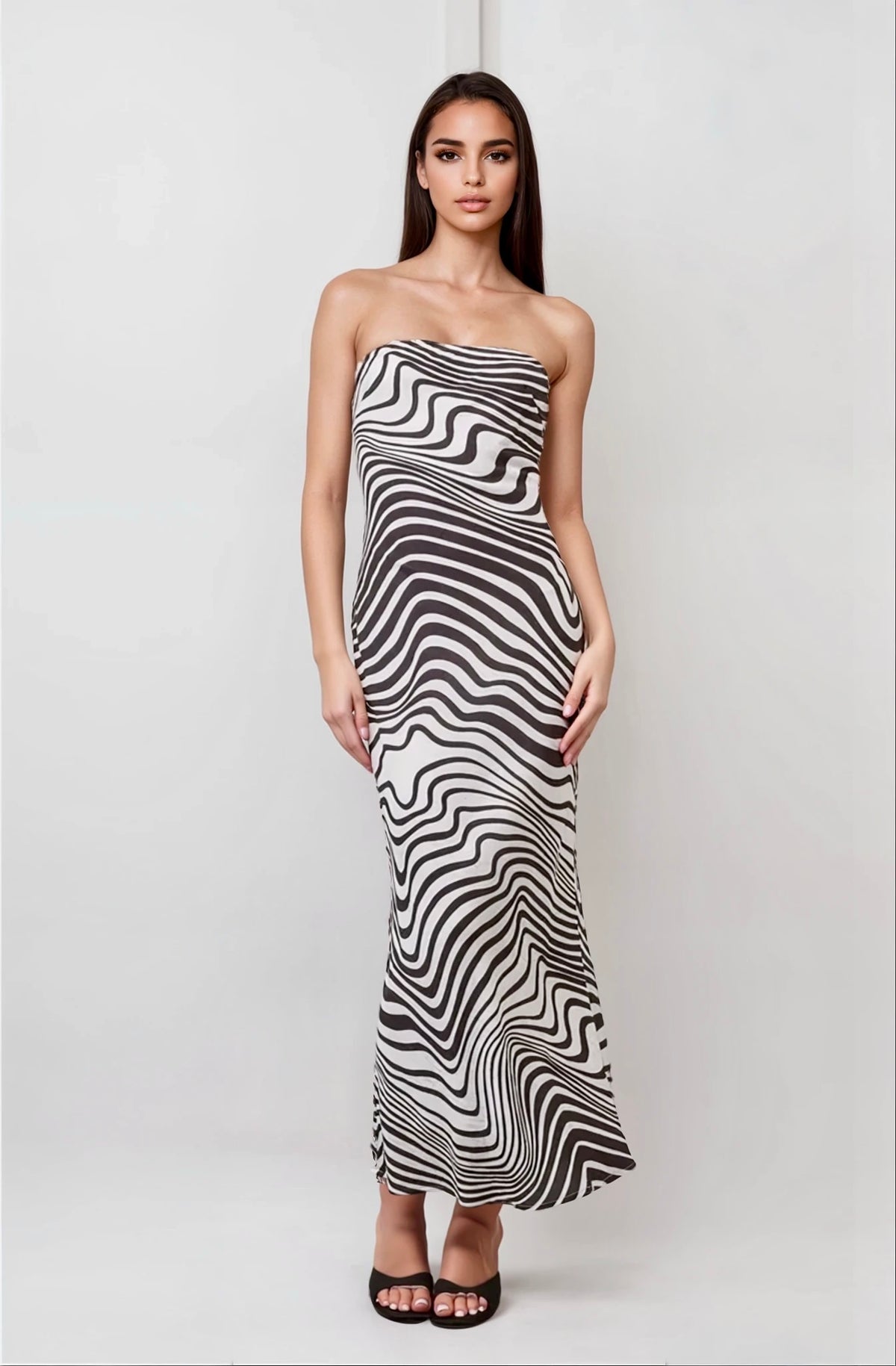 Flowy zebra maxi dress styled for a rockstar-inspired, main character vibe
