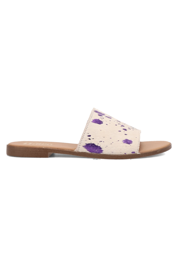Open-toe sandal with natural fur upper designed for warm weather and bold styling

