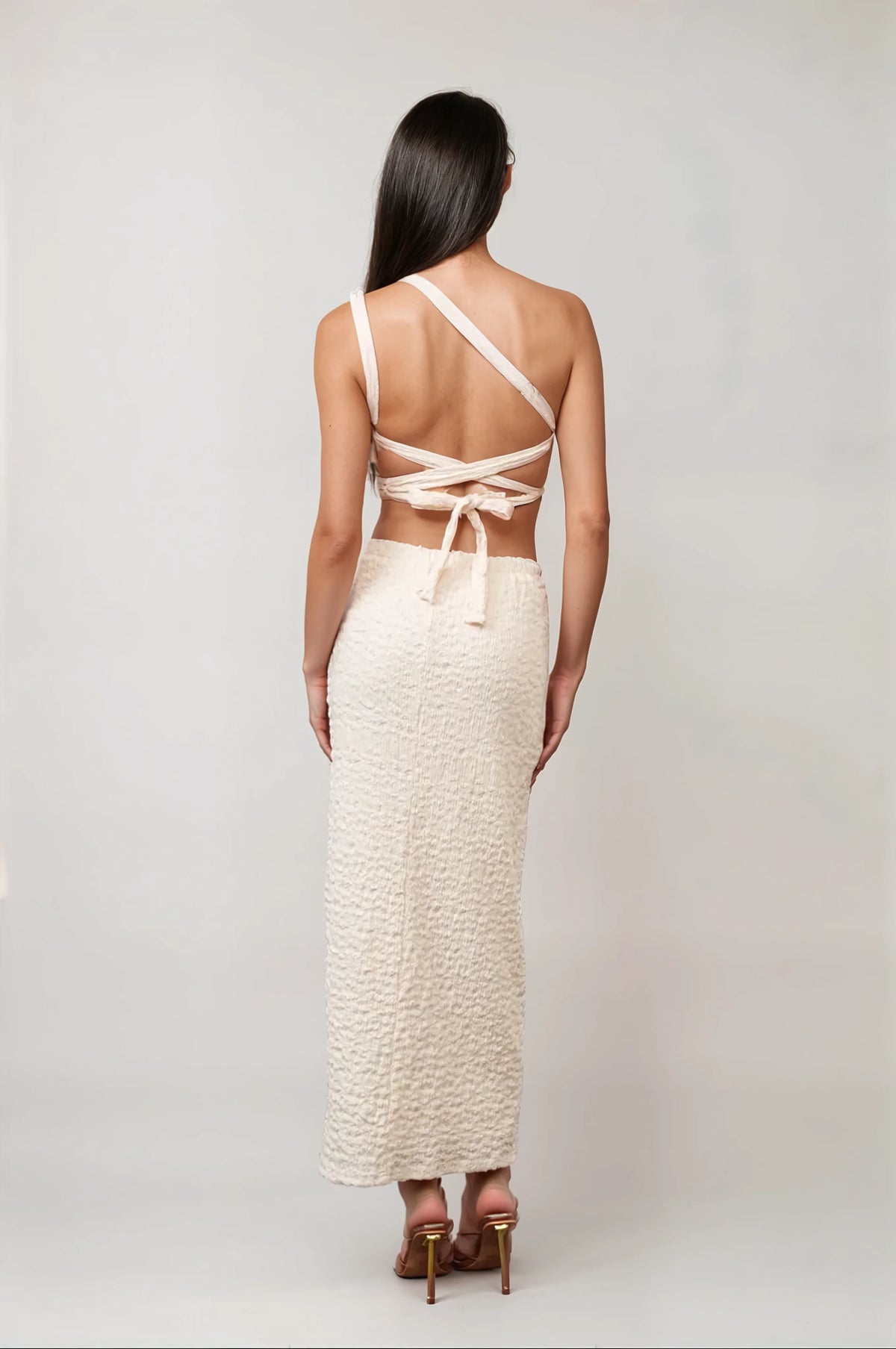 Romantic white cutout maxi dress perfect for weddings, date nights, and special occasions
