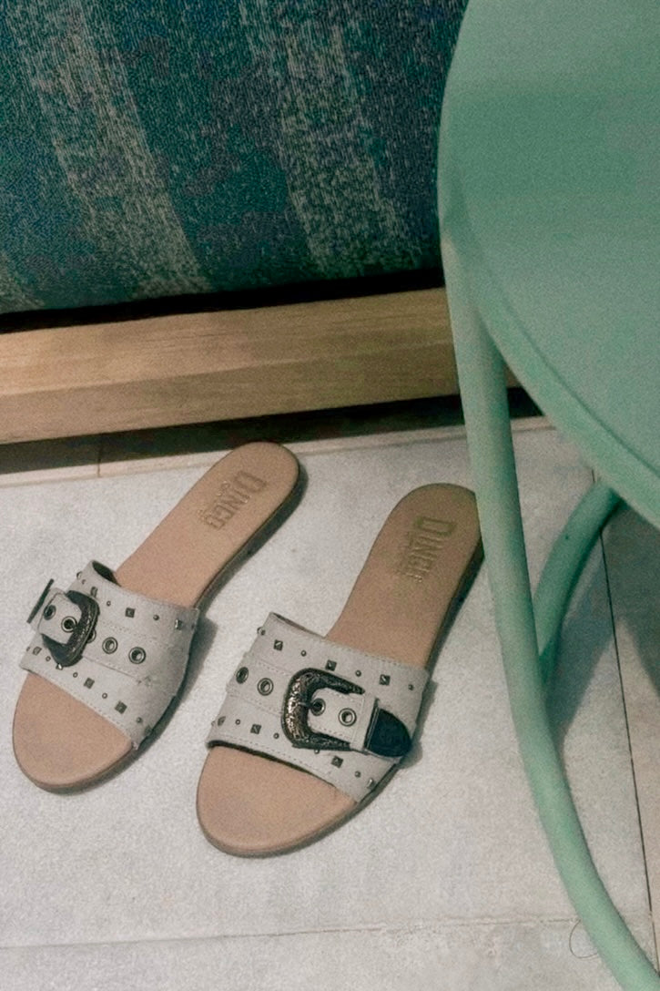 Western-style sandal with round toe and edgy detailing
