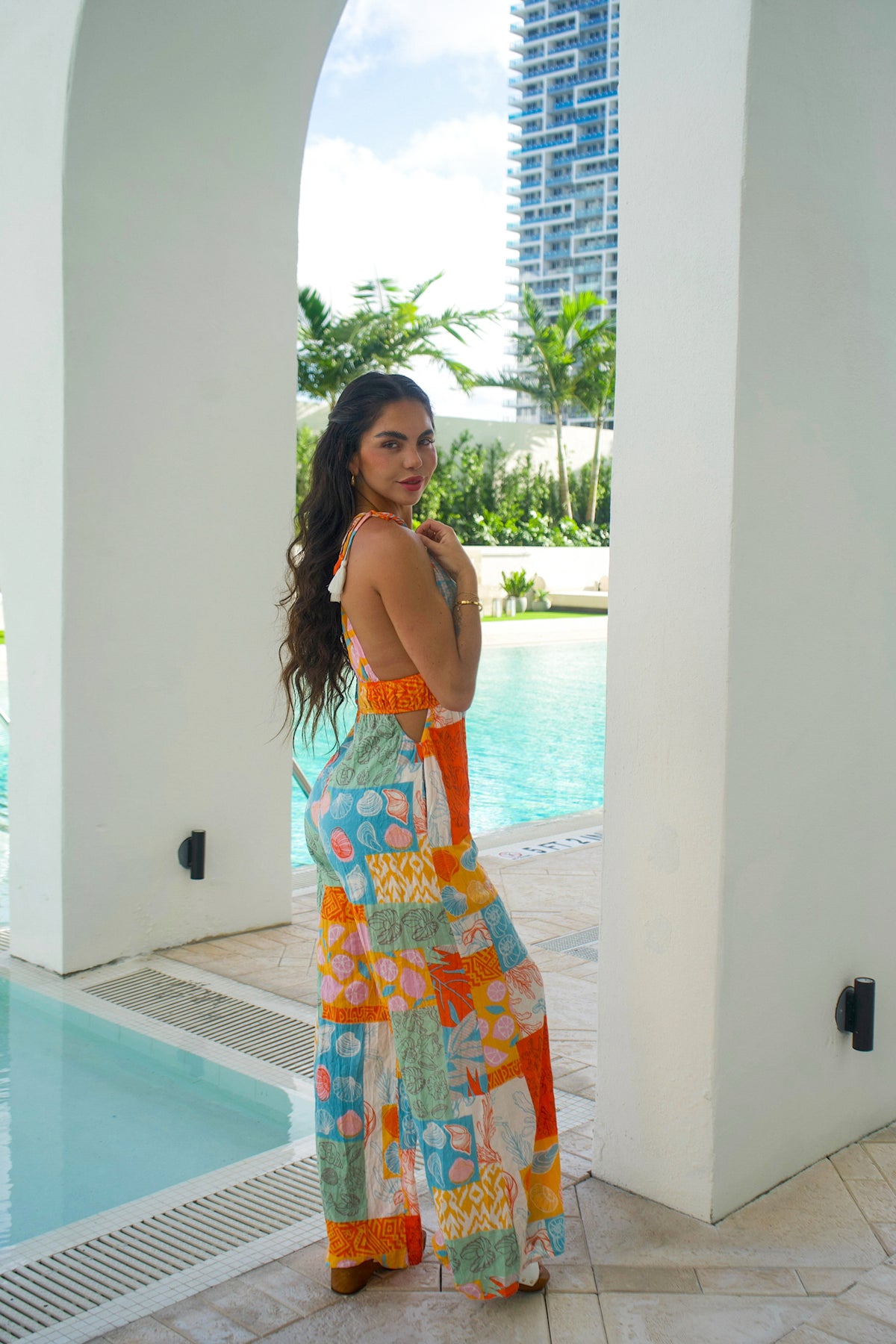 Wide-leg jumpsuit perfect for beach outings with bold tropical print
